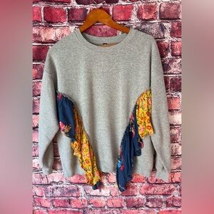 Free People She’s Just Cute Sweatshirt with Colorful Floral Ruffles